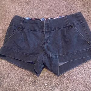 jean shorts with phsycadelic print on inside